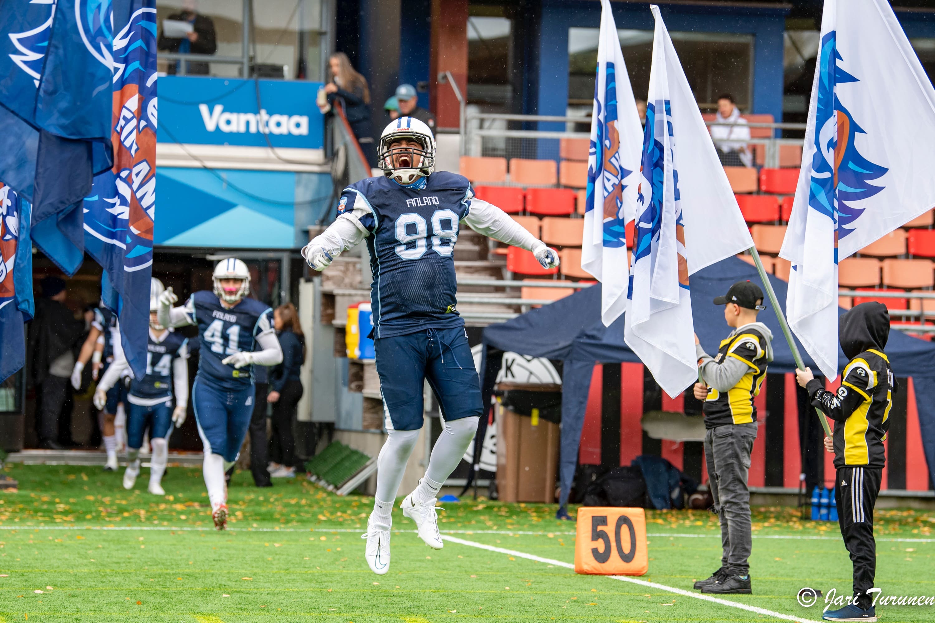 player of finland jumping in the air